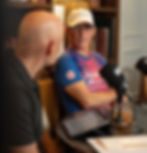 Runner in cap and athletic shirt during interview