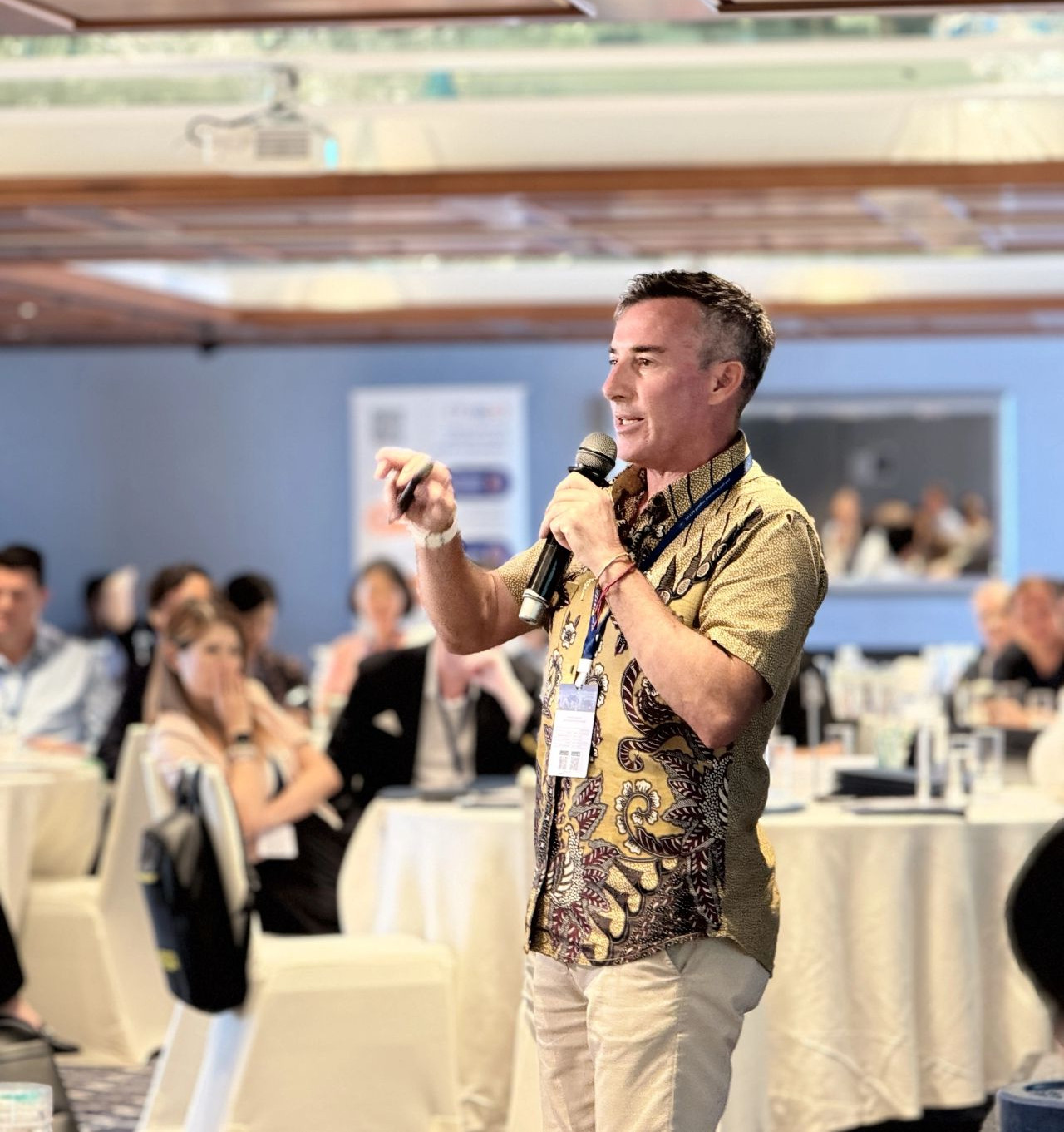 A professional stage microphone set for a High-Performance Resilience Keynote on leadership and sales by Jo Lodder.